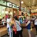 Shoppers wait in line to make their purchases at lululemon during the grand opening of Arbor Hills on Thursday, August 22, 2013. Melanie Maxwell | AnnArbor.com